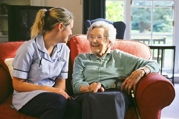 Homehelp carer assisting a client